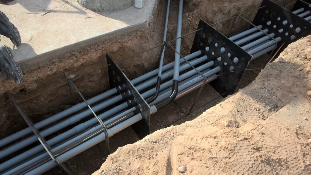 SP Products QwikDuct HDPE custom templates spacing conduit in a trench